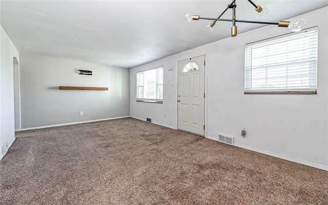 969 Kirsopp Ave, Banksville/Westwood, PA 15220 - entrance foyer with carpet, baseboards, and a chandelier