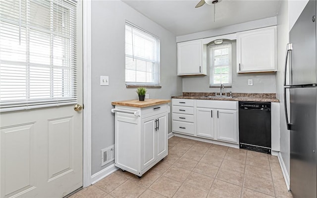 969 Kirsopp Ave, Banksville/Westwood, PA 15220 - kitchen with dishwasher, freestanding refrigerator, a sink, white cabinetry, and a ceiling fan