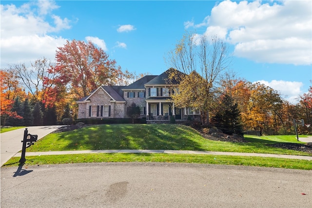 view of front of home with a front lawn