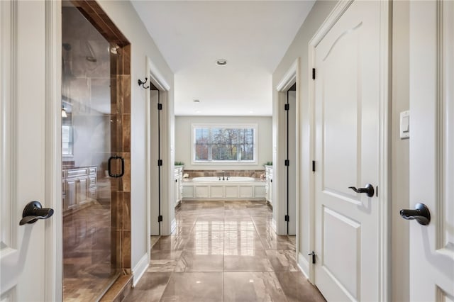 bathroom with independent shower and bath