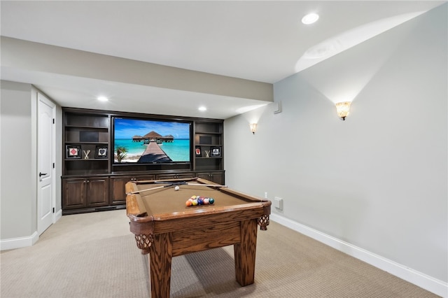 recreation room featuring built in features, light carpet, and billiards