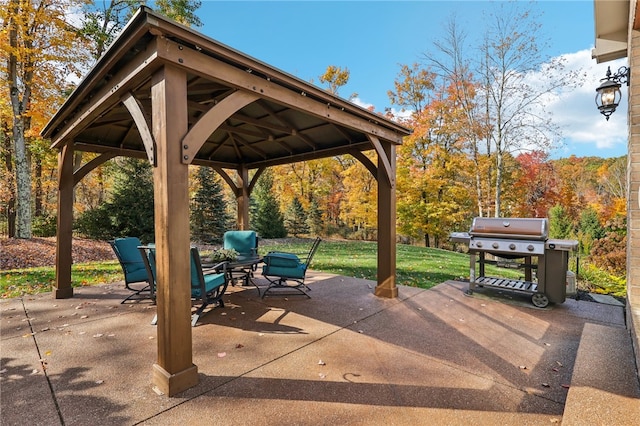 view of patio featuring area for grilling and a gazebo