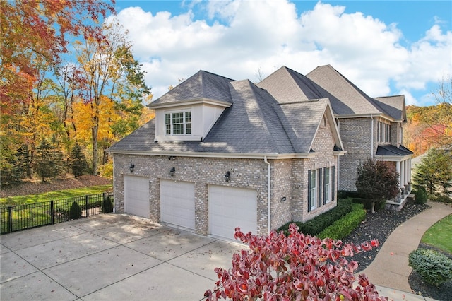 view of property exterior with a garage