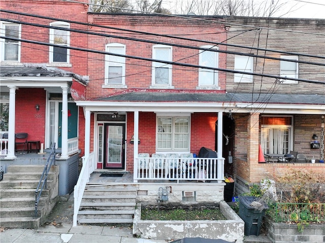 entrance to property with a porch