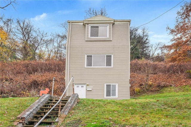 6824 Butler St, Morningside, PA 15206 - back of house with stairway and a lawn