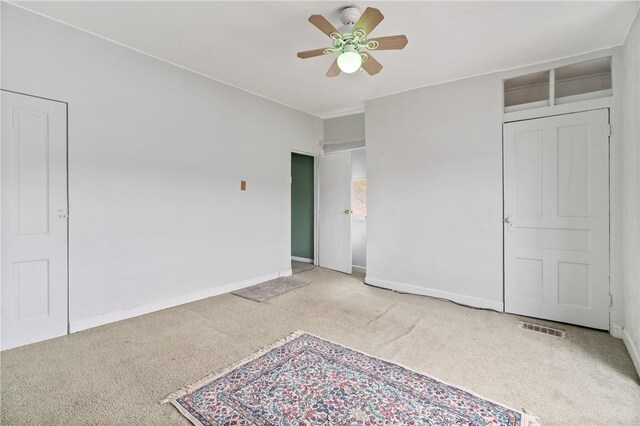 6824 Butler St, Morningside, PA 15206 - unfurnished bedroom with carpet flooring, baseboards, and ceiling fan
