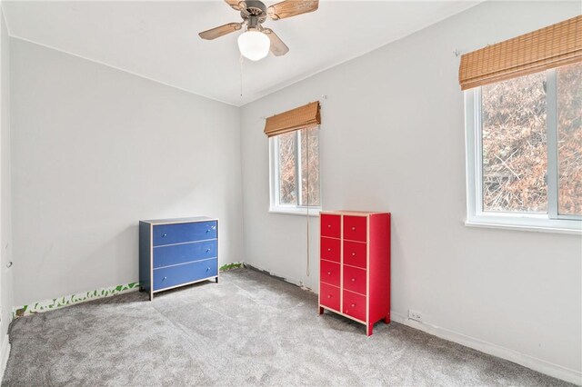6824 Butler St, Morningside, PA 15206 - unfurnished bedroom with multiple windows, carpet, and ceiling fan