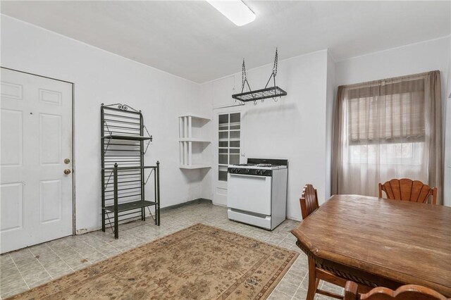 6824 Butler St, Morningside, PA 15206 - kitchen with white range with gas cooktop