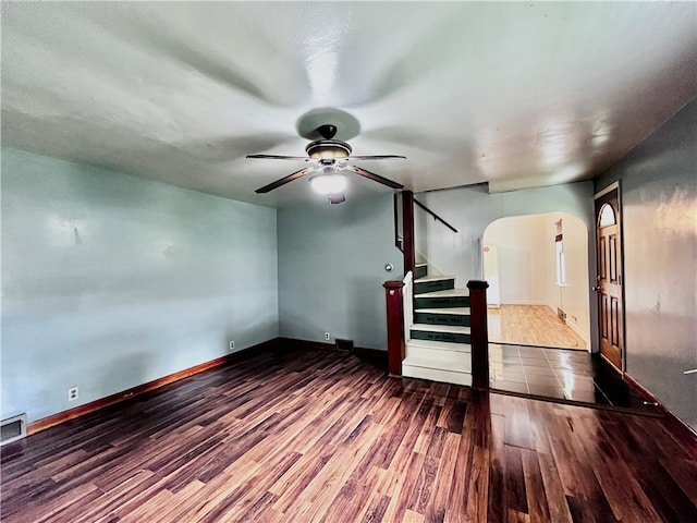 interior space with wood-type flooring and ceiling fan