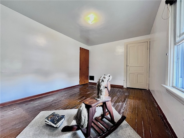 interior space with dark hardwood / wood-style flooring