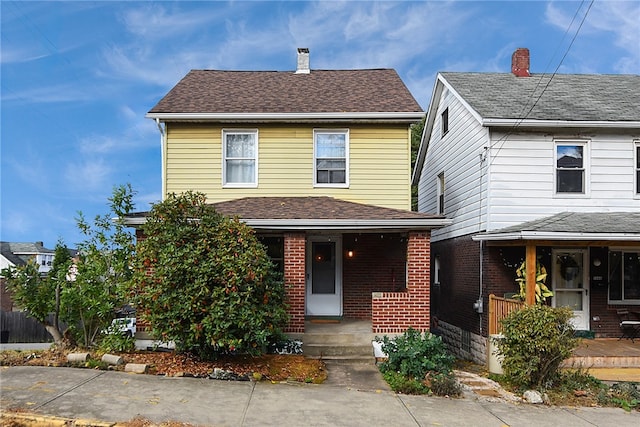 view of property featuring a porch