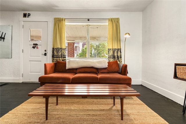 living room with dark wood-type flooring