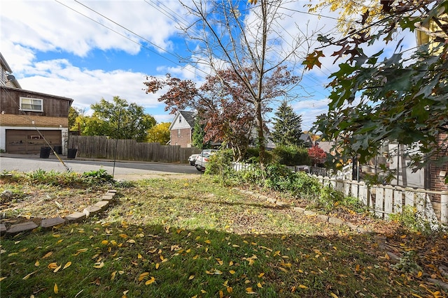 view of yard with a garage