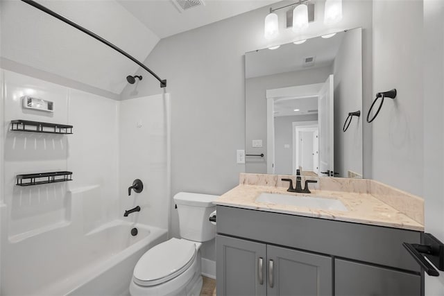 full bathroom featuring vanity, tub / shower combination, and toilet