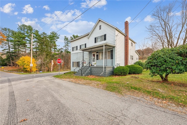 view of front property featuring a porch