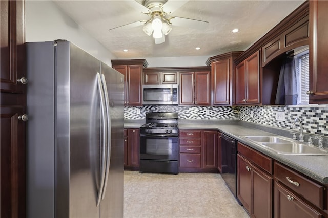 kitchen featuring black appliances, backsplash, sink, and ceiling fan