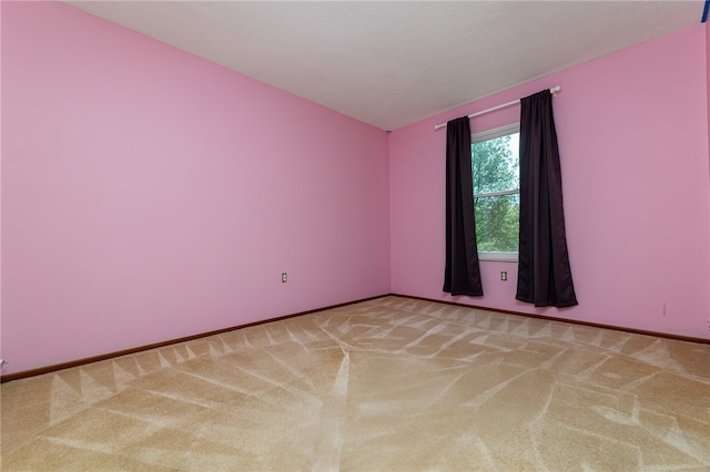 empty room featuring carpet flooring