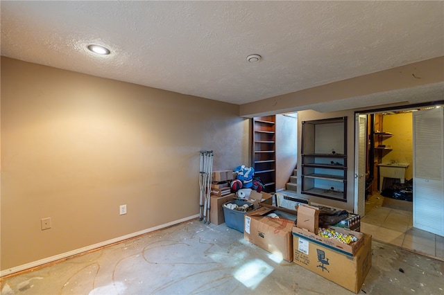 interior space featuring a textured ceiling