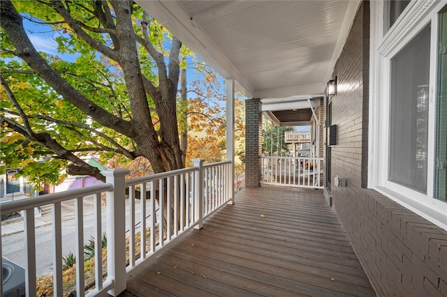 wooden terrace with covered porch