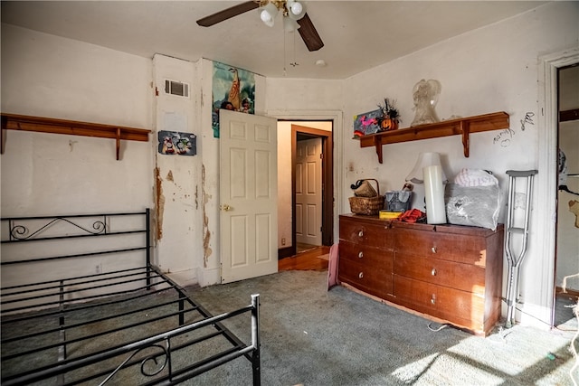 bedroom with ceiling fan and carpet floors