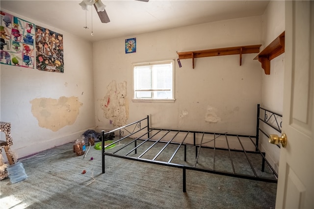 unfurnished bedroom featuring carpet flooring and ceiling fan