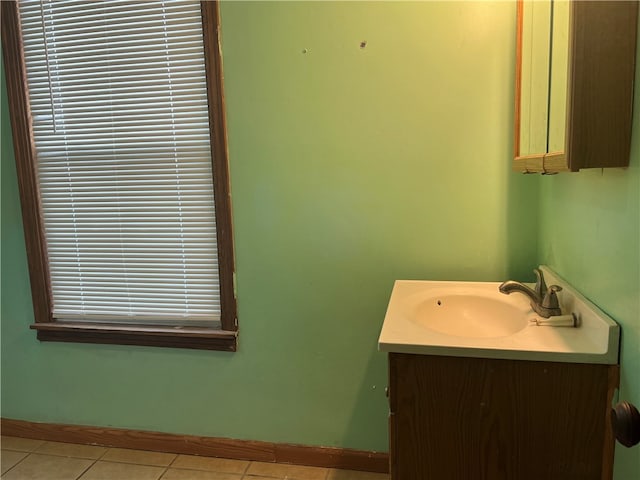 bathroom with vanity and tile patterned flooring