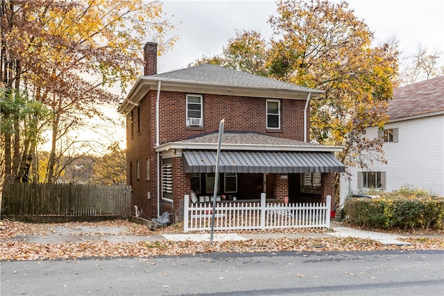 front facade featuring covered porch