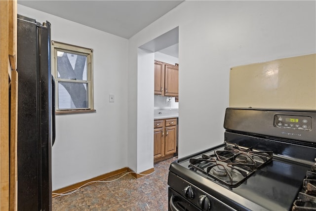 kitchen with black range with gas stovetop