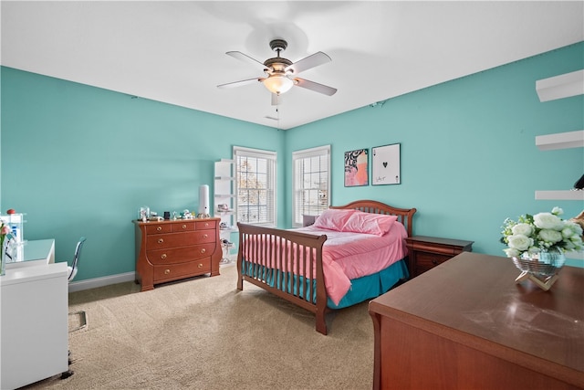 bedroom with light colored carpet and ceiling fan