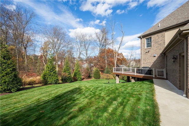 view of yard featuring a deck