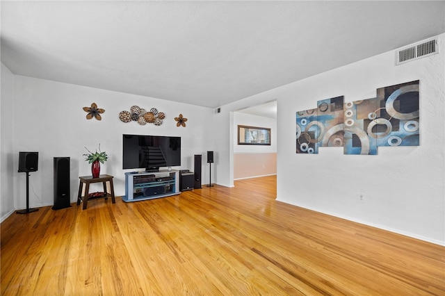 living room with wood-type flooring