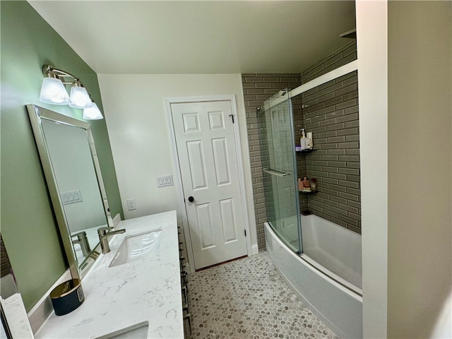 bathroom with enclosed tub / shower combo and vanity