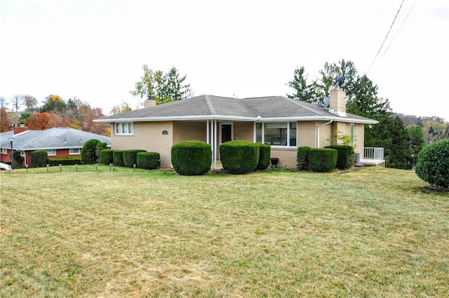 view of front of home with a front lawn