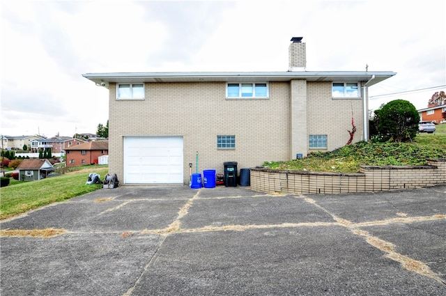 view of property exterior with a garage