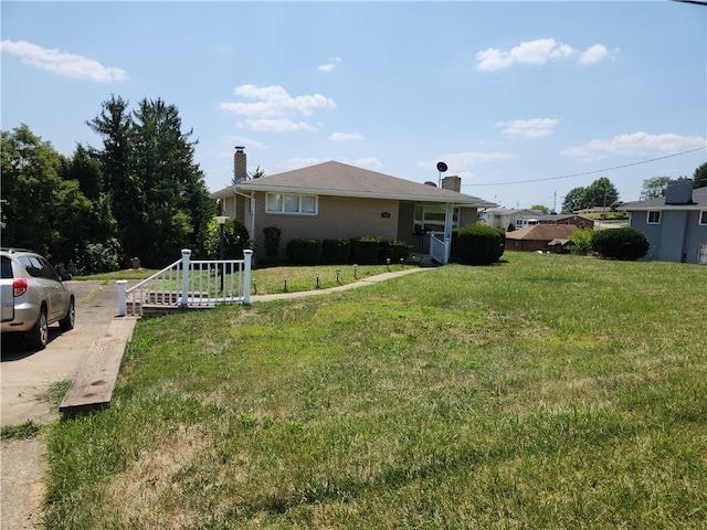 exterior space with a front yard