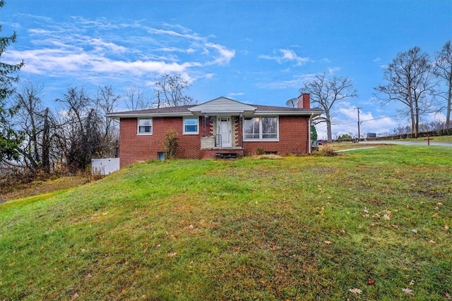 ranch-style home with a front yard