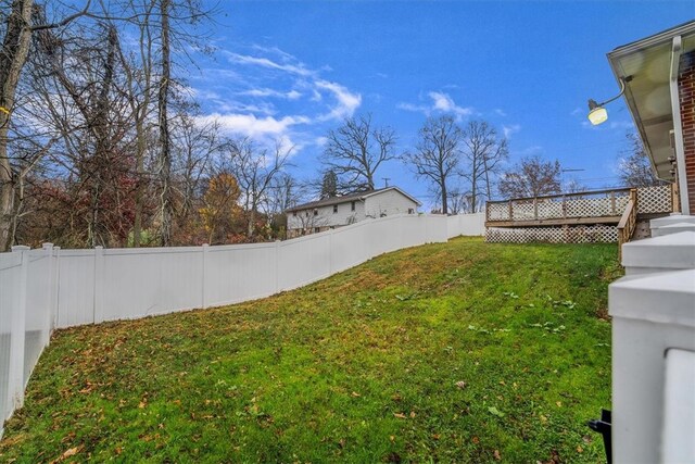 view of yard featuring a deck