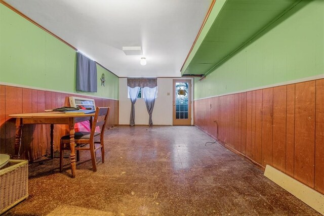 interior space featuring wood walls