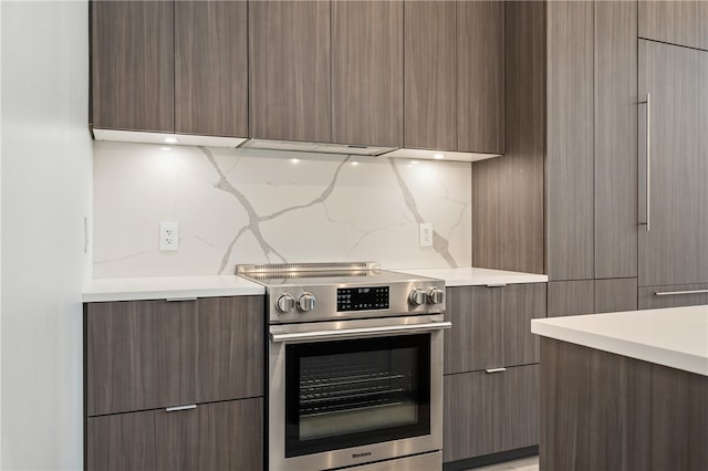 kitchen featuring tasteful backsplash and stainless steel stove