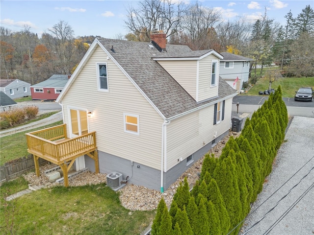 view of side of property featuring a garage