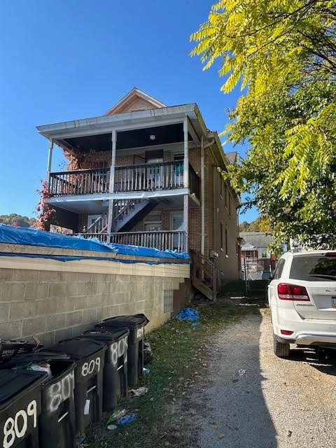 view of home's exterior featuring a balcony