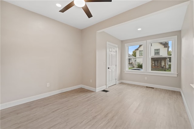 unfurnished room with light hardwood / wood-style floors and ceiling fan