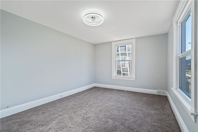 view of carpeted spare room