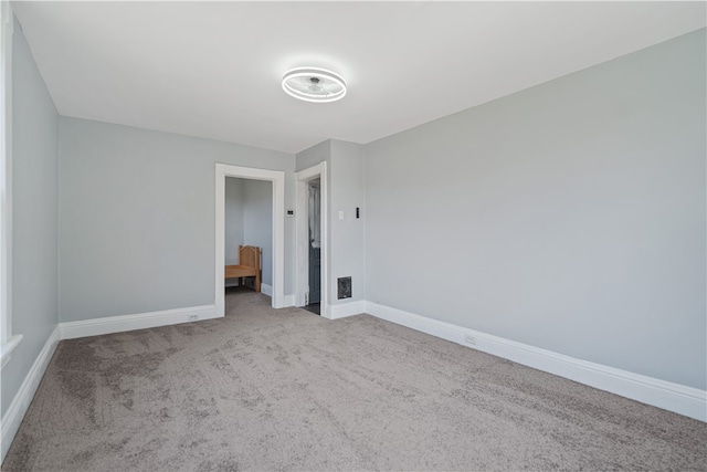 unfurnished bedroom with light carpet