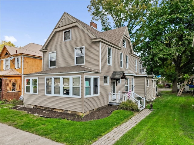 exterior space featuring a front lawn