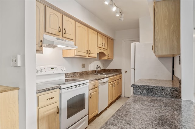 kitchen featuring light brown cabinets, sink, and white appliances