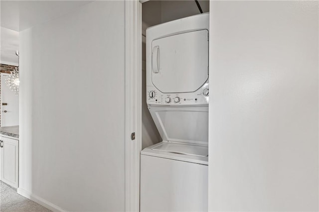1000 Margarite Dr Unit G, Scott Twp Sal, PA 15216 - washroom featuring stacked washer / dryer and carpet flooring