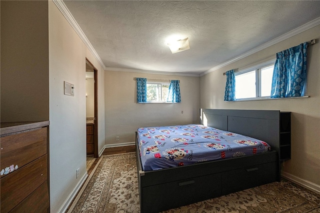 bedroom featuring a textured ceiling and crown molding