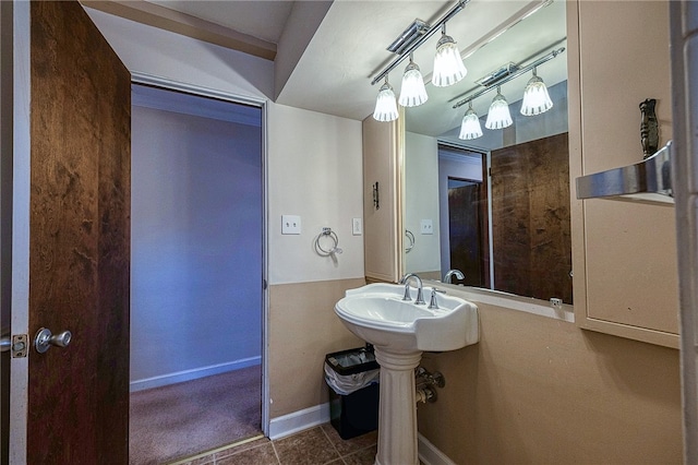 bathroom with tile patterned floors