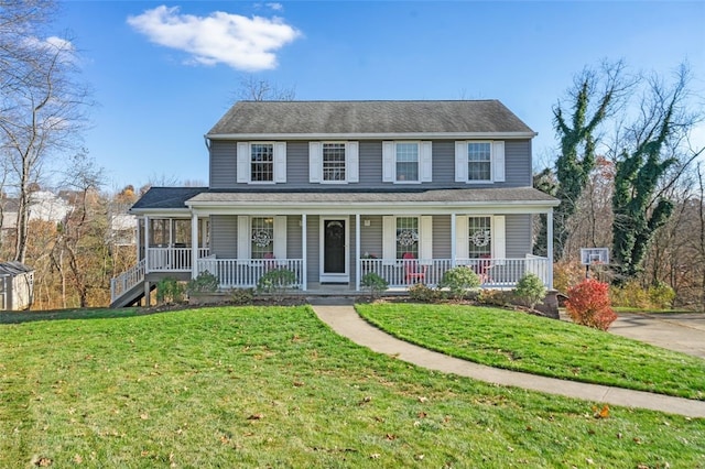 view of front of home with a front lawn and covered porch